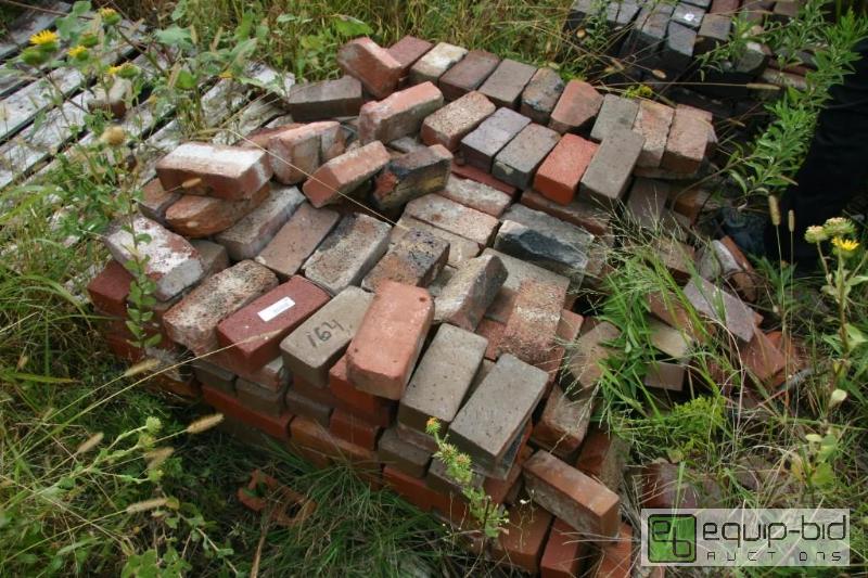 lot 164 image: large pile of pavers...