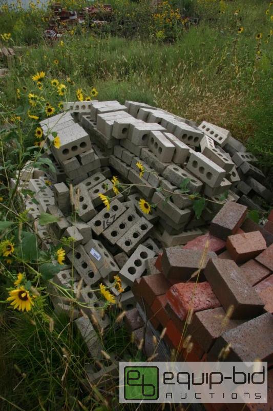 lot 167 image: large lot of gray 3 hole bricks...