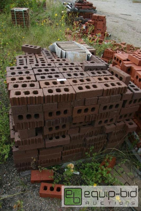 lot 174 image: large pallet of brown 3 hole brick...