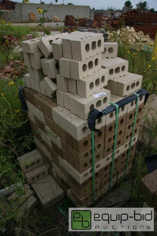 lot 179 image: large pallet of beige and buff 3 hole bricks...