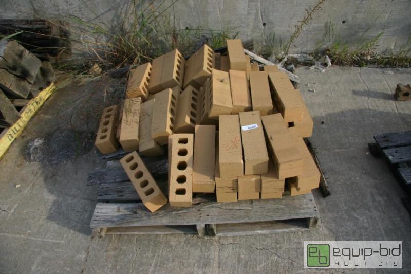 lot 210 image: pallet of beige 5 hole bricks...