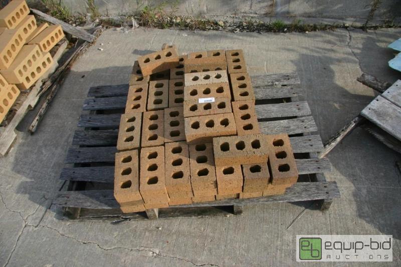 lot 211 image: pallet of 3 hole beige bricks...