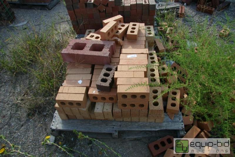 lot 223 image: pallet of beige 3 hole bricks...