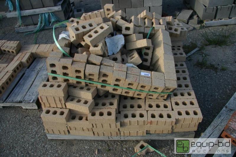 lot 227 image: pallet of beige 3 hole brick...