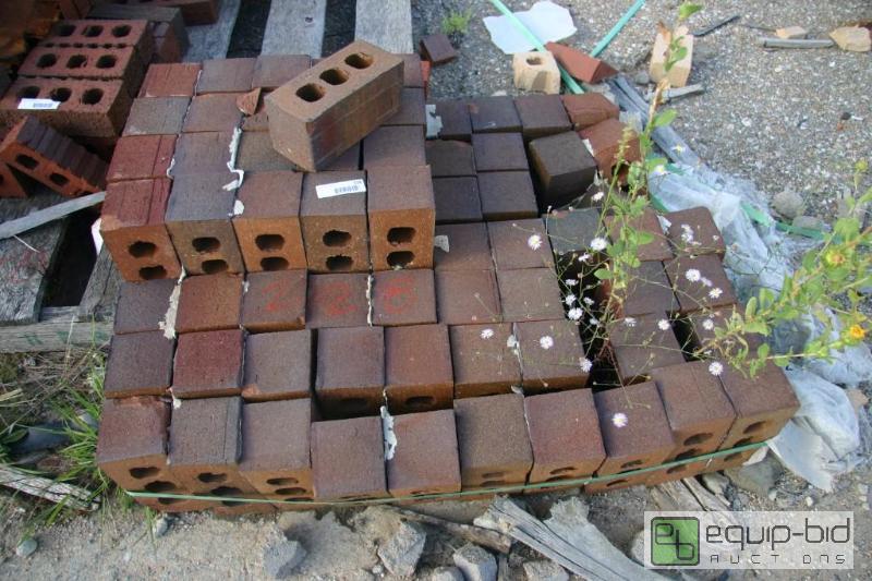 lot 228 image: pile of 3 hole red bricks...
