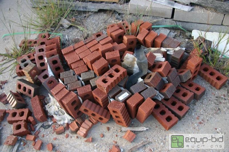 lot 231 image: pile of 3 hole bricks...