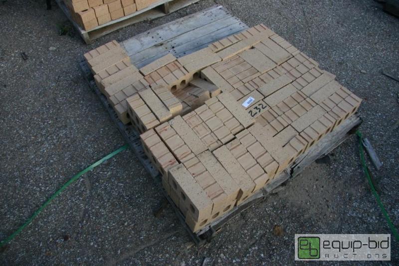 lot 232 image: pallet of buff 3 hole bricks...