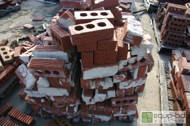 lot 238 image: large lot of used 3 hole bricks...