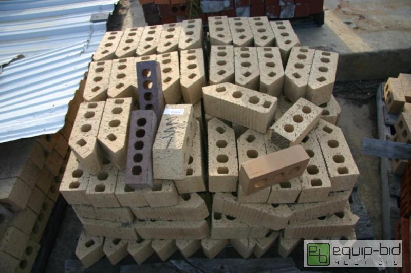 lot 251 image: pallet of buff 4 hole bricks...