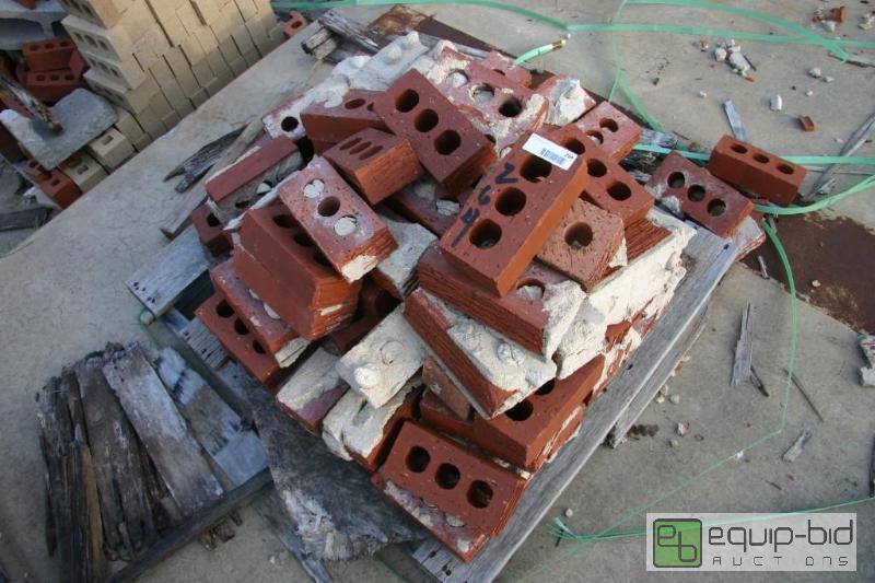lot 264 image: pallet of used 3 hole bricks...