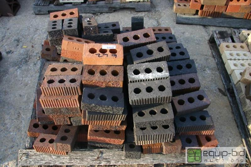 lot 279 image: pallet of dark 3 hole bricks...