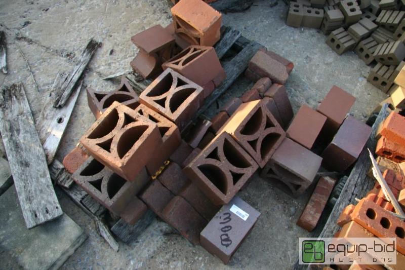 lot 308 image: pile of custom cinder blocks...