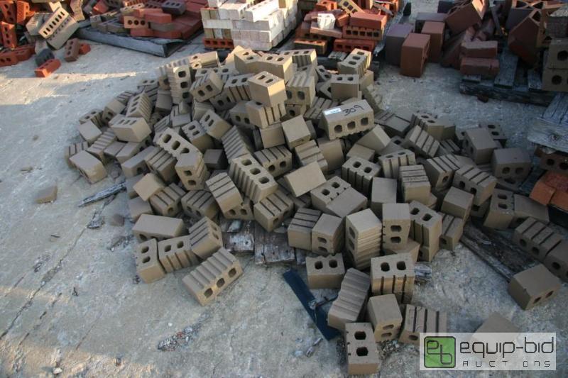 lot 309 image: large pile of sandstone bricks...