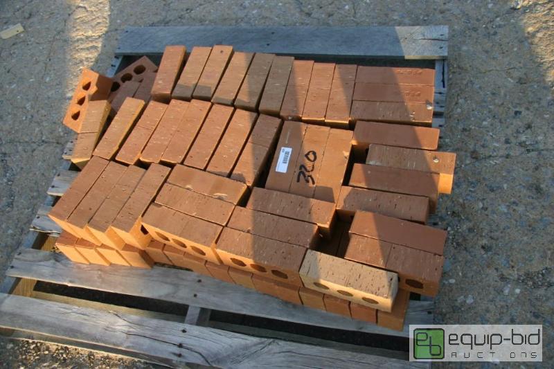 lot 320 image: pallet of beige 3 hole bricks...