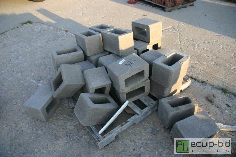 lot 321 image: pile of cinder blocks...