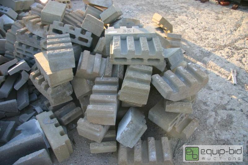 lot 331 image: large pile of custom cinder blocks...