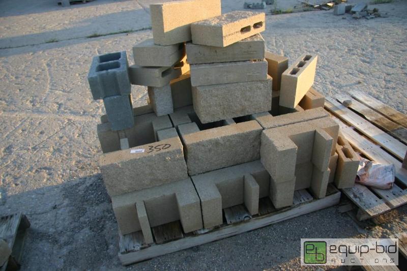 lot 350 image: pallet of rough edge cinder blocks and L shap...