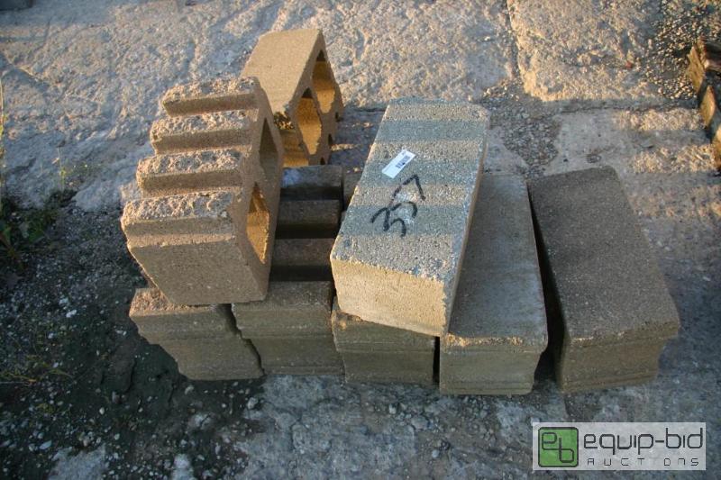 lot 357 image: stack of cinder blocks...