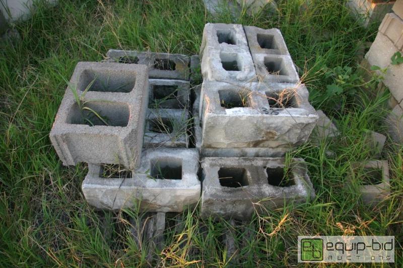 lot 375 image: 2 piles of rough face cinder blocks...
