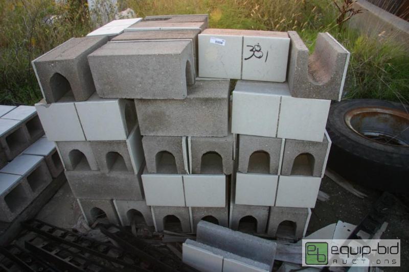lot 381 image: 2 pallets of enamel faced cinder blocks...