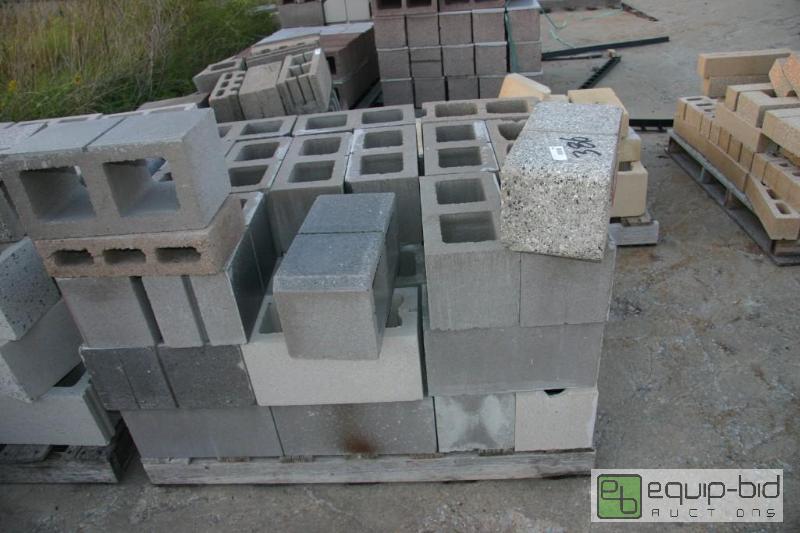 lot 386 image: enamel faced cinder blocks...