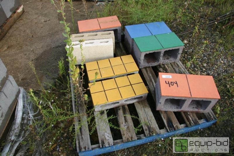 lot 404 image: pallet of enamel faced cinder blocks...