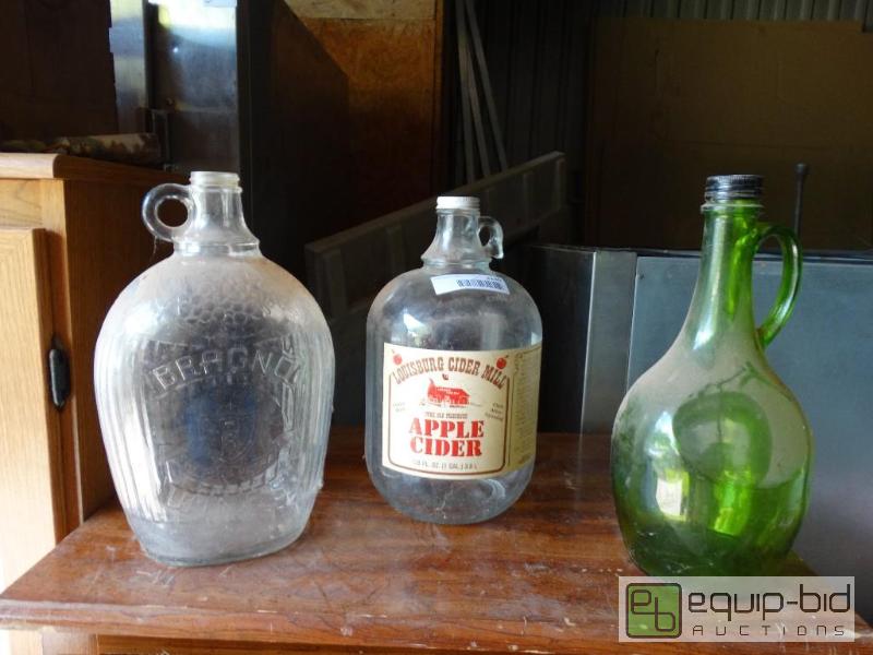 lot 1230 image: 3 Old bottles.  1 Of the bottles is&nbsp&quo...