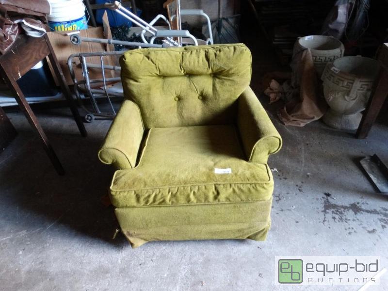 lot 1255 image: Vintage green chair. With a torn piece.&nbsp...