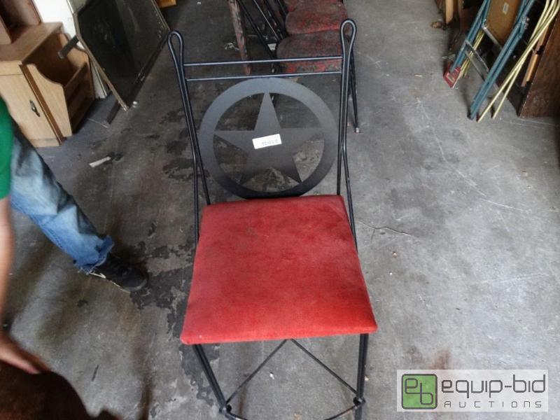 lot 1260 image: Red and black metal chair.  (3 12 ft tall)...