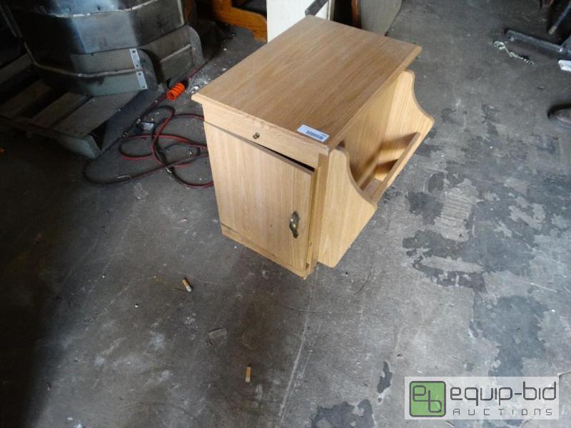 lot 1265 image: End table with magazine rack and door....