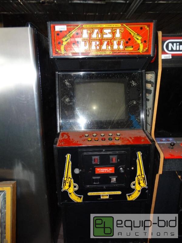lot 1282 image: Fast Draw arcade game 1982.  (Stern seberg) &...