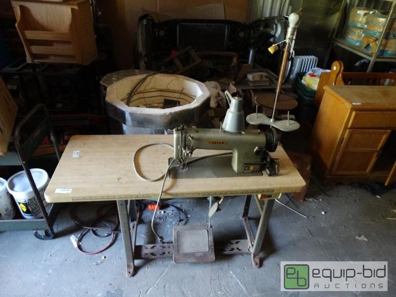 lot 1318 image: Sewing machine cabinet with lamp.  Single pha...