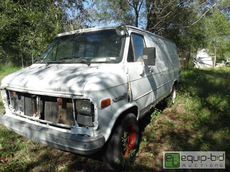 lot 15 image: 1985 GM cargo van.  Bill of sale....