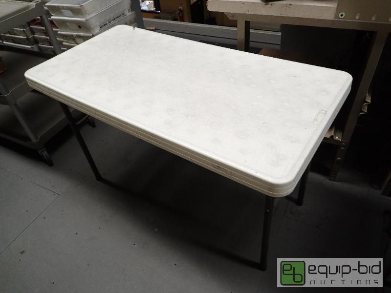 lot 1521B image: 42x24 Lifetime Plastic Top Folding Metal Base Table