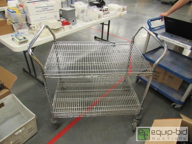 lot 2592 image: 2 Tier Metal Wire Storage Cart on Casters