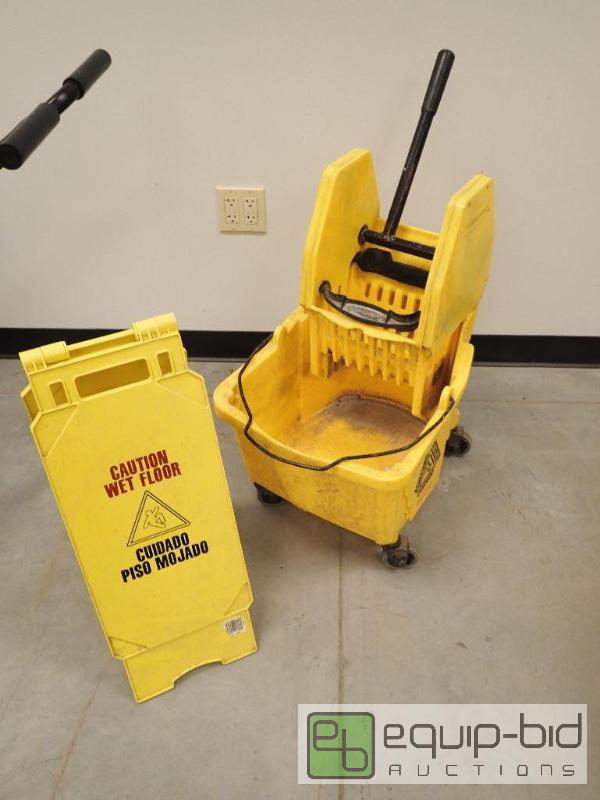 lot 626 image: Rubbermaid Mop Bucket With Wet Floor Sign