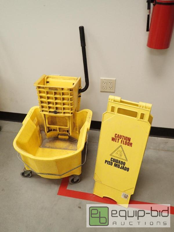 lot 628 image: Rubbermaid Mop Bucket With Wet Floor Sign