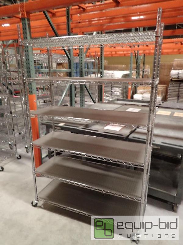 lot 719 image: 6 Tier Metal Wire Rack On Casters 46x18x72