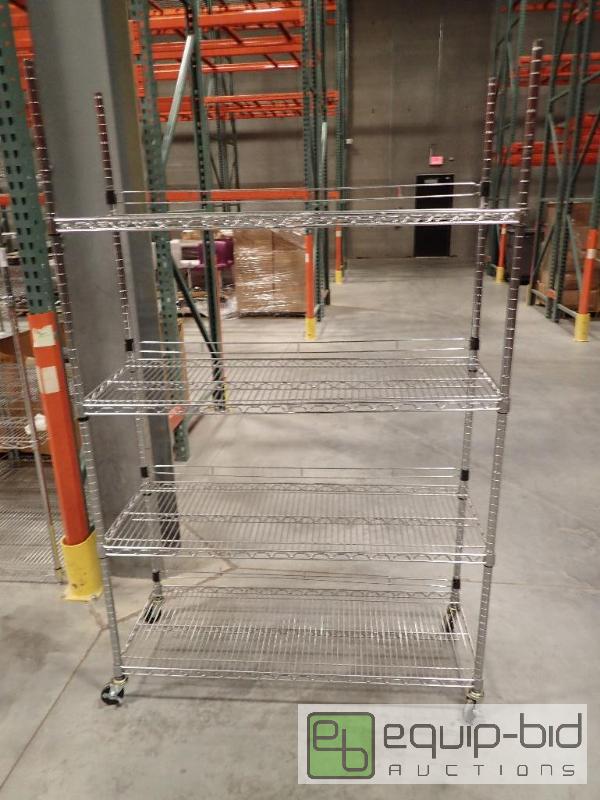lot 724 image: 4 Tier Metal Wire Metro Storage Rack On Casters 48x18x74