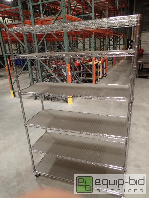lot 725 image: 6 Tier Metal Wire Rack On Casters 48x18x74