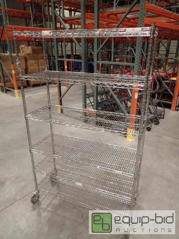 lot 726 image: 6 Tier Metal Wire Rack On Casters 48x18x74