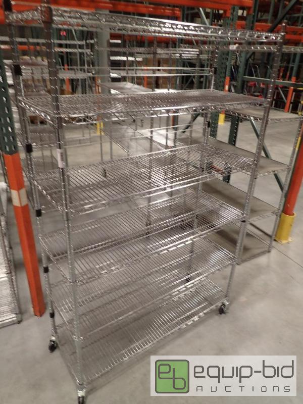 lot 734 image: 6 Tier Metal Wire Rack On Casters 42x18x72