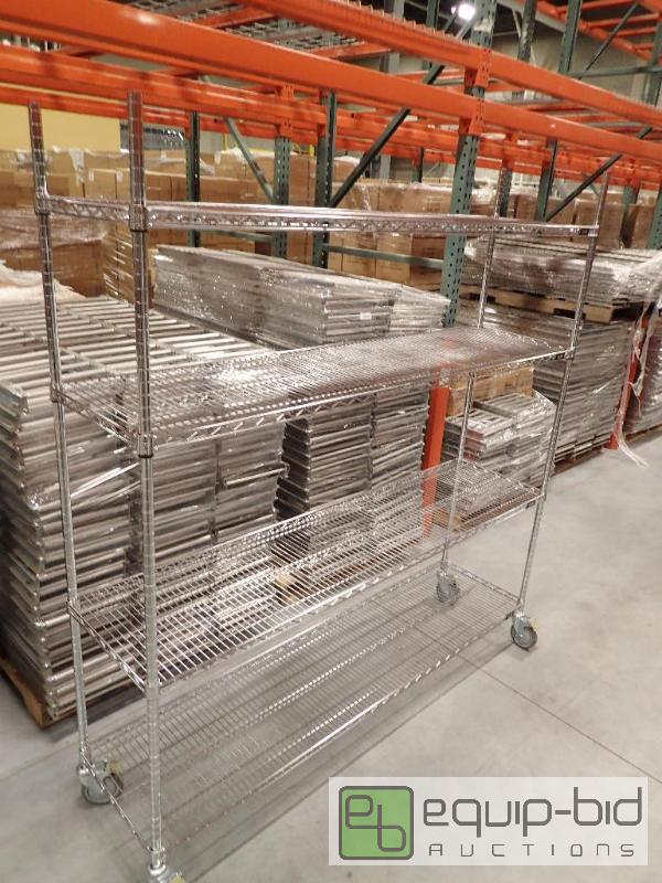 lot 738 image: 4 Tier Metal Wire Metro Storage Rack On Casters 70x18x74