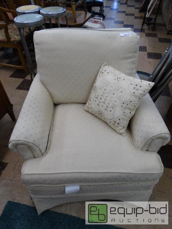 lot 503 image: Cream color upholstered club chair with pillo...