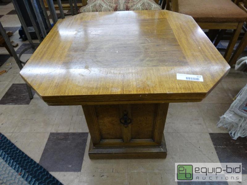 lot 517 image: Light wood end table with under storage....