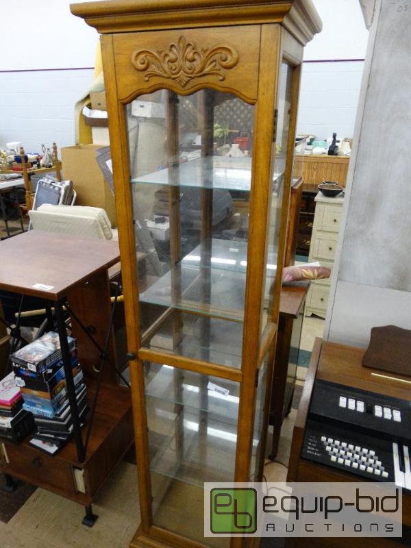 lot 523 image: Nice looking square wood lighted curio cabine...