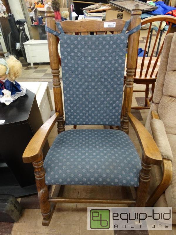 lot 548 image: Large wood rocking chair with blue upholstere...