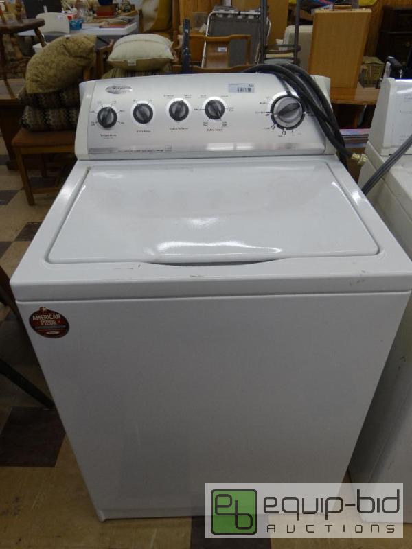 lot 553 image: Whirlpool top load washing machine with hoses...