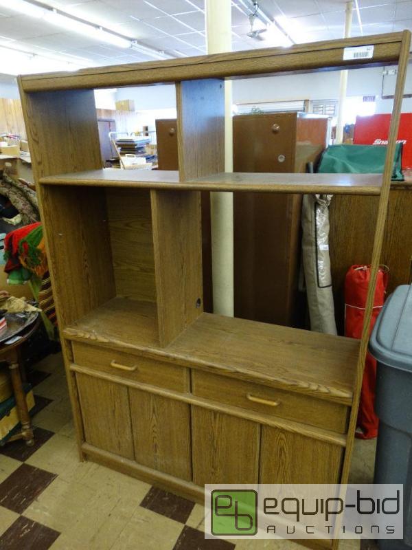 lot 567 image: Entertainment center with 2 drawers and under...
