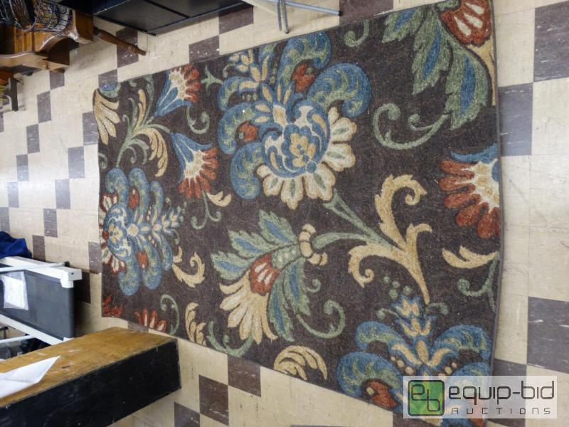lot 570 image: 5 x 8 area rug.  Brown with floral design....